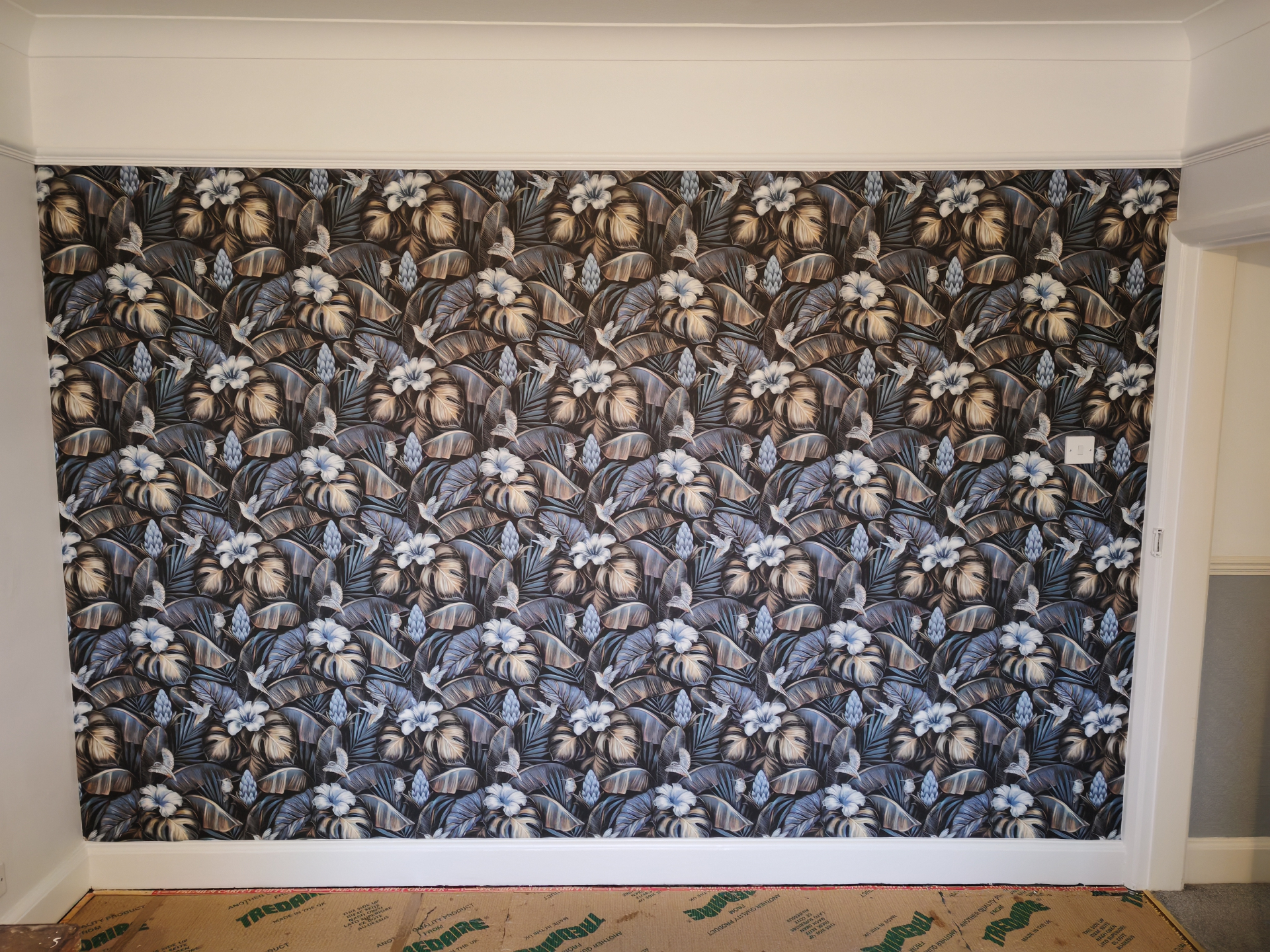 Final wide shot of the completed tropical feature wall